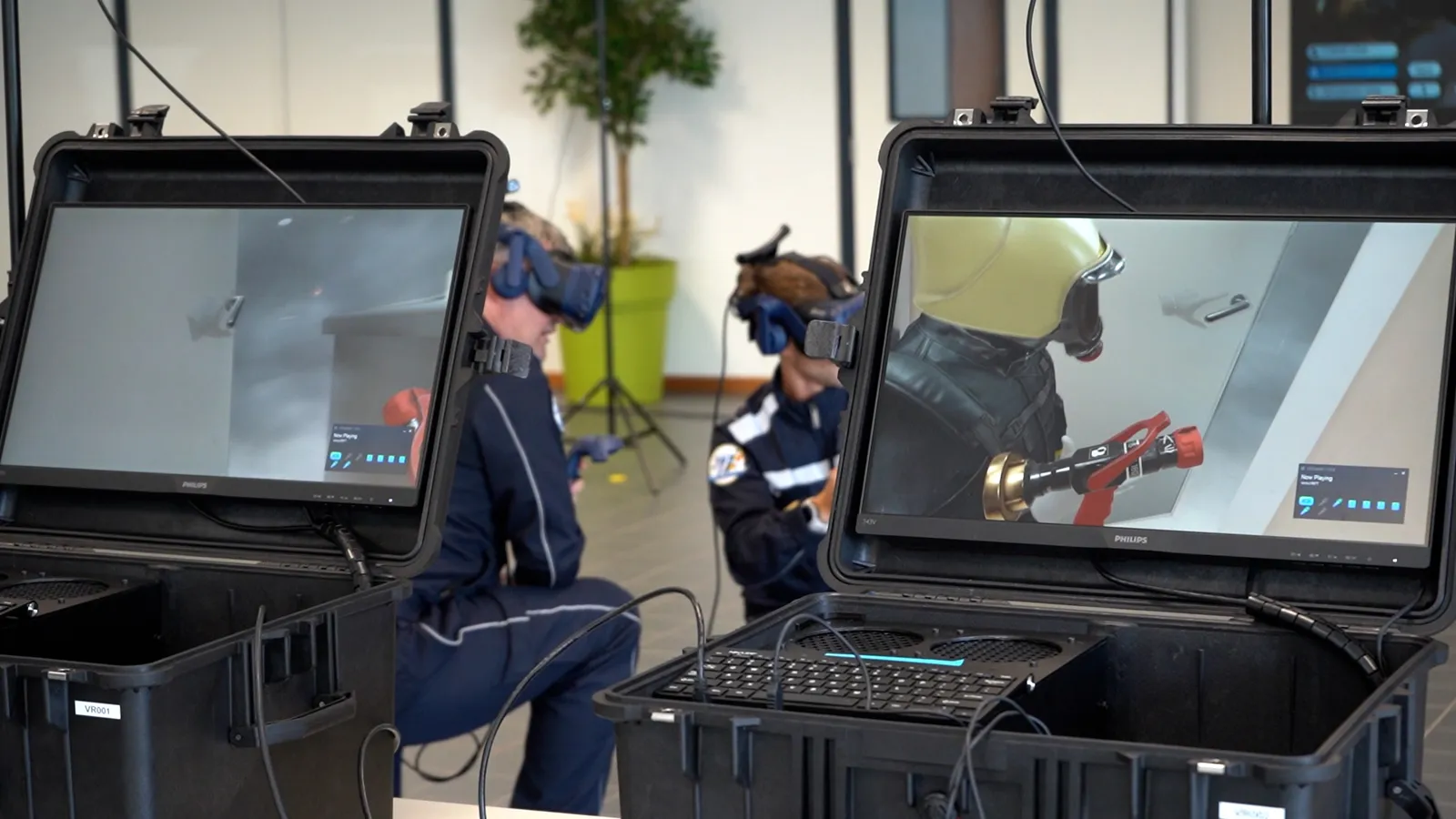 Marines practising firefighting in VR with mobile training cases