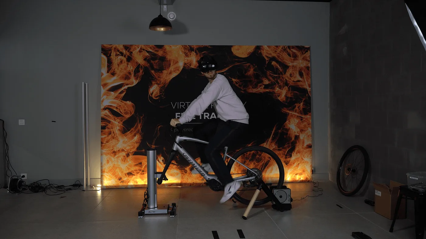 A rider on OneBonsai's custom-built e-bike simulator